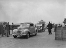 Ford V8 drophead of DB Hall at the RAC Rally, Madeira Drive, Brighton, 1939. Artist: Bill Brunell