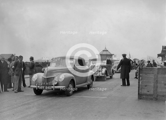 Ford V8 drophead of DB Hall at the RAC Rally, Madeira Drive, Brighton, 1939. Artist: Bill Brunell.