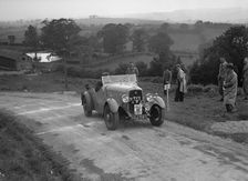 Ford V8 of TC Wise competing in the South Wales Auto Club Welsh Rally, 1937 Artist: Bill Brunell