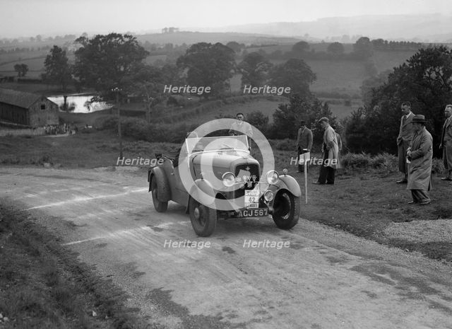 Ford V8 of TC Wise competing in the South Wales Auto Club Welsh Rally, 1937 Artist: Bill Brunell.