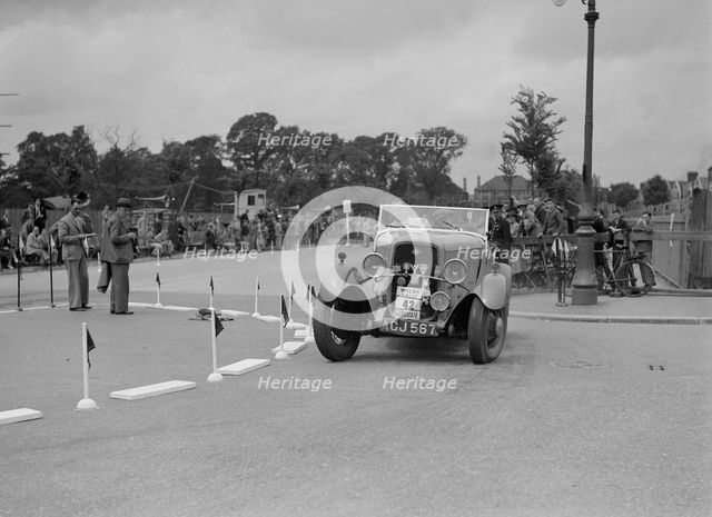 Ford V8 of TC Wise competing in the South Wales Auto Club Welsh Rally, 1937 Artist: Bill Brunell.