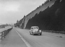 Ford V8 of CGH Barraclough on Madeira Drive, Brighton, RAC Rally, 1939. Artist: Bill Brunell