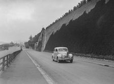 Ford V8 of CGH Barraclough on Madeira Drive, Brighton, RAC Rally, 1939. Artist: Bill Brunell
