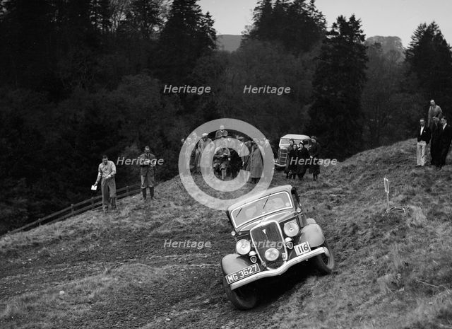 Ford V8 of DG Silcock competing in the MCC Edinburgh Trial, Roxburghshire, Scotland, 1938. Artist: Bill Brunell.