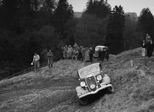 Ford V8 of DG Silcock competing in the MCC Edinburgh Trial, Roxburghshire, Scotland, 1938. Artist: Bill Brunell