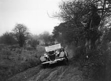 Ford V8 of H Hillcoat at the Sunbac Colmore Trial, near Winchcombe, Gloucestershire, 1934. Artist: Bill Brunell