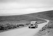Ford V8 of J McEvoy, winner of a bronze award at the MCC Torquay Rally, July 1937. Artist: Bill Brunell