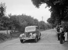 Ford V8 of J McEvoy, winner of a bronze award at the MCC Torquay Rally, July 1937. Artist: Bill Brunell