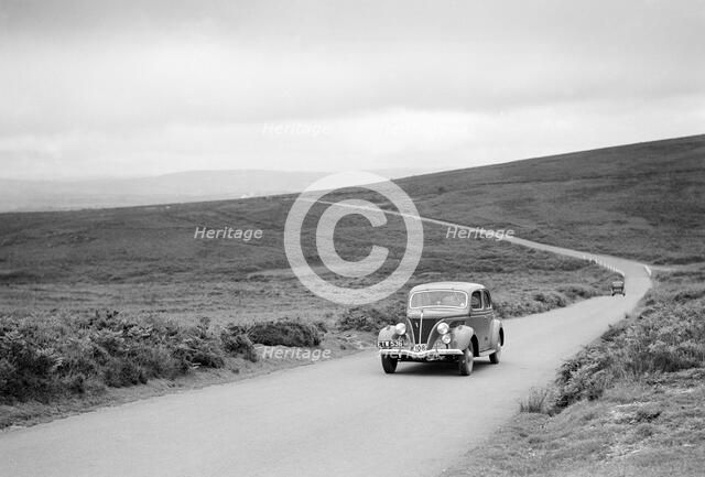 Ford V8 of J McEvoy, winner of a bronze award at the MCC Torquay Rally, July 1937. Artist: Bill Brunell.