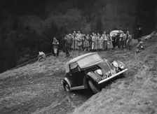 Ford V8 of J Cleland competing in the MCC Edinburgh Trial, Roxburghshire, Scotland, 1938. Artist: Bill Brunell