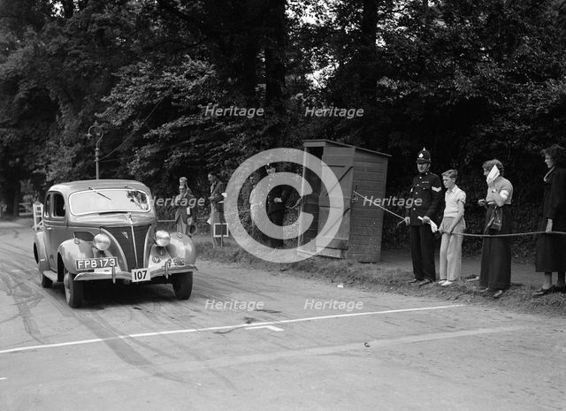 Ford V8 of J Harrison, winner of a bronze award at the MCC Torquay Rally, July 1937. Artist: Bill Brunell.