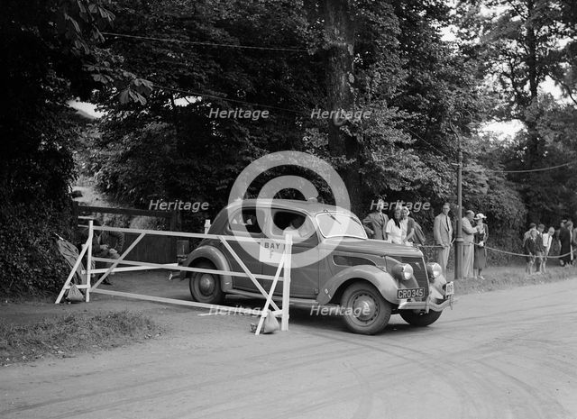 Ford V8 of J Whalley, winner of a bronze award at the MCC Torquay Rally, July 1937. Artist: Bill Brunell.