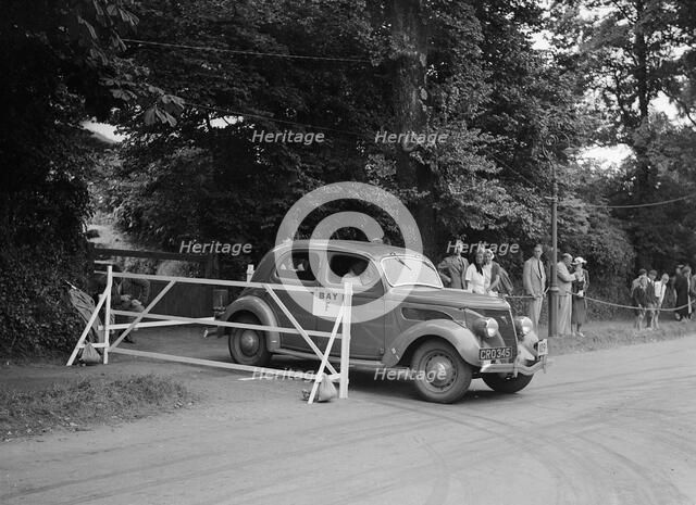 Ford V8 of J Whalley, winner of a bronze award at the MCC Torquay Rally, July 1937. Artist: Bill Brunell.