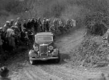 Ford V8 of Major DEM Douglas-Morris competing in the MCC Lands End Trial, 1935. Artist: Bill Brunell