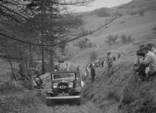 Ford V8 of Miss V Wild competing in the MG Car Club Abingdon Trial/Rally, 1939. Artist: Bill Brunell
