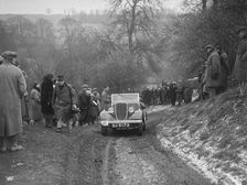 Ford V8 open tourer of H Hillcoat competing at the Sunbac Colmore Trial, Gloucestershire, 1933. Artist: Bill Brunell