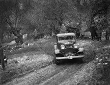 Ford V8 open tourer of H Hillcoat competing in the Sunbac Colmore Trial, Gloucestershire, 1933. Artist: Bill Brunell