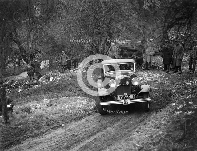 Ford V8 open tourer of H Hillcoat competing in the Sunbac Colmore Trial, Gloucestershire, 1933. Artist: Bill Brunell.