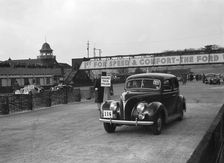 Ford V8 saloon competing in the JCC Rally, Brooklands, Surrey, 1939. Artist: Bill Brunell