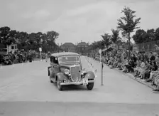 Ford V8 saloon of AE Harris competing in the South Wales Auto Club Welsh Rally, 1937 Artist: Bill Brunell