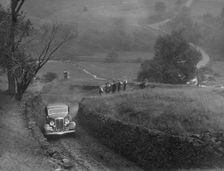 Ford V8 saloon of F Allott competing in the MCC Sporting Trial, 1935. Artist: Bill Brunell