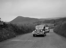 Ford V8 saloon of HJ Parsons competing in the South Wales Auto Club Welsh Rally, 1937 Artist: Bill Brunell