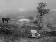 Ford V8 saloon of RE Alexander competing in the MCC Sporting Trial, 1935. Artist: Bill Brunell