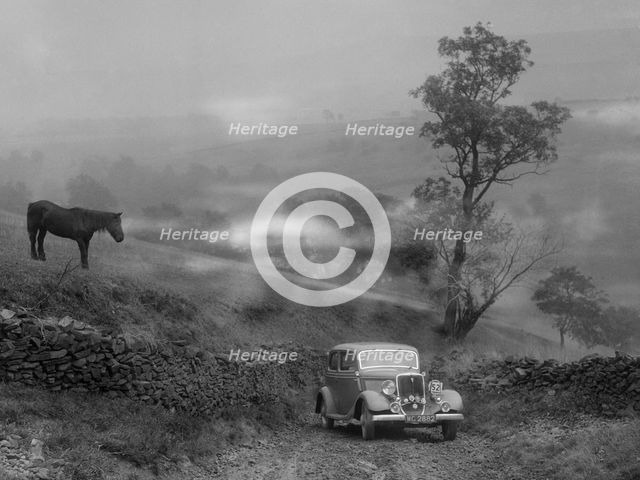 Ford V8 saloon of RE Alexander competing in the MCC Sporting Trial, 1935. Artist: Bill Brunell.
