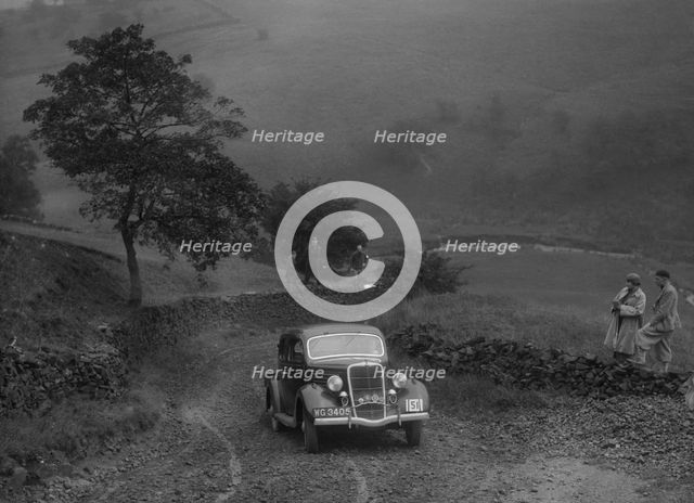 Ford V8 saloon of WS Millar competing in the MCC Sporting Trial, 1935. Artist: Bill Brunell.