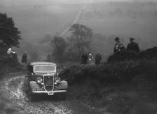 Ford V8 saloon of WT Platt competing in the MCC Sporting Trial, 1935. Artist: Bill Brunell