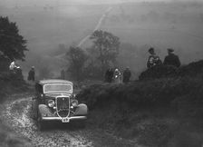 Ford V8 saloon of WT Platt competing in the MCC Sporting Trial, 1935. Artist: Bill Brunell