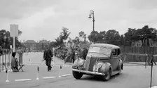 Ford V8 saloon of Viscountess Chetwynd competing in the South Wales Auto Club Welsh Rally, 1937 Artist: Bill Brunell