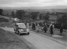 Ford V8 saloon of Viscountess Chetwynd competing in the South Wales Auto Club Welsh Rally, 1937 Artist: Bill Brunell
