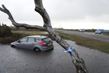Ford Focus in flooded ditch after losing control on wet road 2012