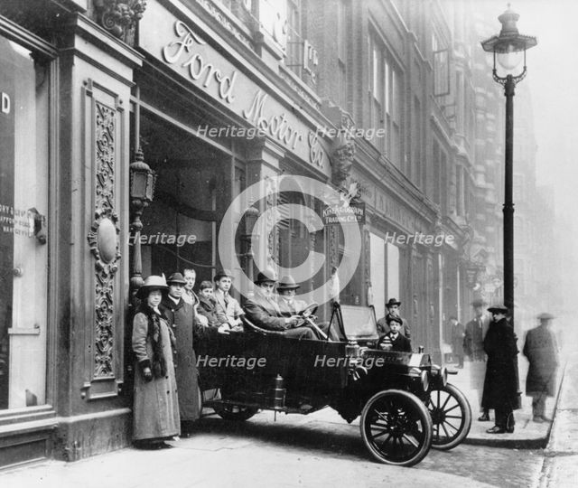 Ford Model T leaving showroom circa 1911. Creator: Unknown.
