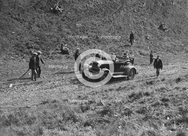 Ford Model A of FH Grain competing in the MCC Sporting Trial, Litton Slack, Derbyshire, 1930. Artist: Bill Brunell.