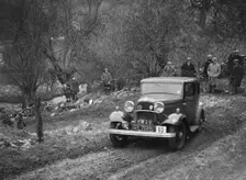 Ford Model B of K Hutchison competing in the Sunbac Colmore Trial, Gloucestershire, 1933. Artist: Bill Brunell