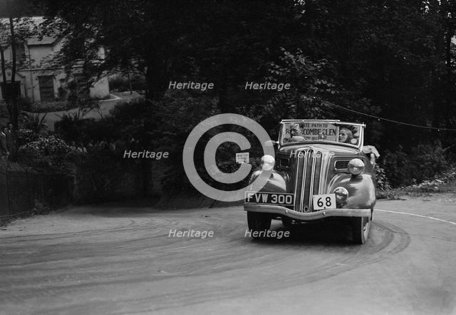 Ford Model C 10 of J McEvoy competing in the MCC Torquay Rally, Torbay, Devon, 1938. Artist: Bill Brunell.