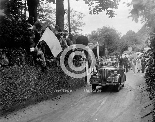 Ford Model C 10 of J Whalley competing in the MCC Torquay Rally, Torbay, Devon, 1938. Artist: Bill Brunell.