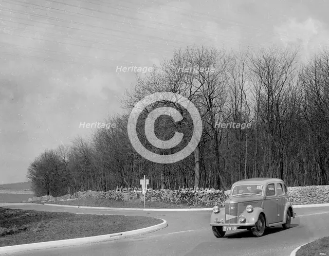 Ford of J McEvoy competing in the RAC Rally, 1939. Artist: Bill Brunell.