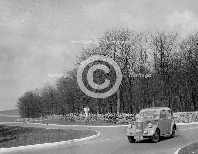 Ford of J McEvoy competing in the RAC Rally, 1939. Artist: Bill Brunell.