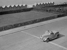 Ford Prefect tourer of JW Whalley competing in the RAC Rally, Madeira Drive, Brighton, 1939. Artist: Bill Brunell