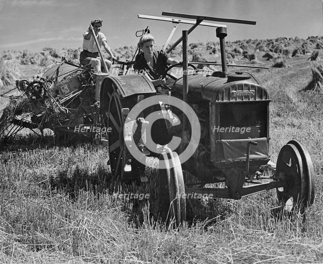 Fordson tractor, with Land girls 1940's. Creator: Unknown.