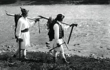 Foresters carrying their tools, Bistrita Valley, Moldavia, north-east Romania, c1920-c1945. Artist: Adolph Chevalier