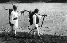 Foresters carrying their tools, Bistrita Valley, Moldavia, north-east Romania, c1920-c1945. Artist: Adolph Chevalier