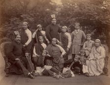 Formal Family Portrait of Thirteen People, Men in European Dress, 1860s-70s. Creator: Unknown
