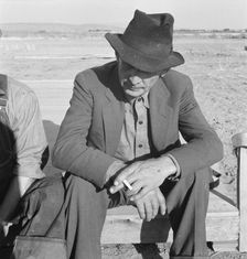 Former Nebraska farmer, now a migrant farm worker, Klamath County, Oregon, 1939. Creator: Dorothea Lange