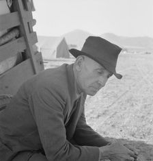 Former Nebraska farmer, now a migrant farm worker, Klamath County, Oregon, 1939. Creator: Dorothea Lange