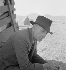 Former Nebraska farmer, now a migrant farm worker, Klamath County, Oregon, 1939. Creator: Dorothea Lange
