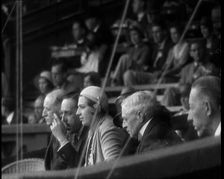 Former King Alphonso of Spain and His Wife, Victoria Eugenie of Battenberg Watching Tennis, 1930s. Creator: British Pathe Ltd